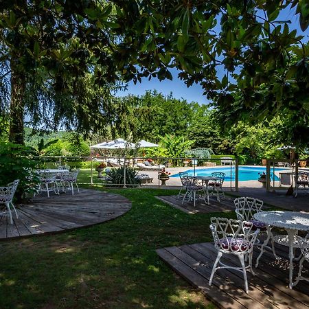 Hotel Restaurant Le Centenaire Les Eyzies Bagian luar foto