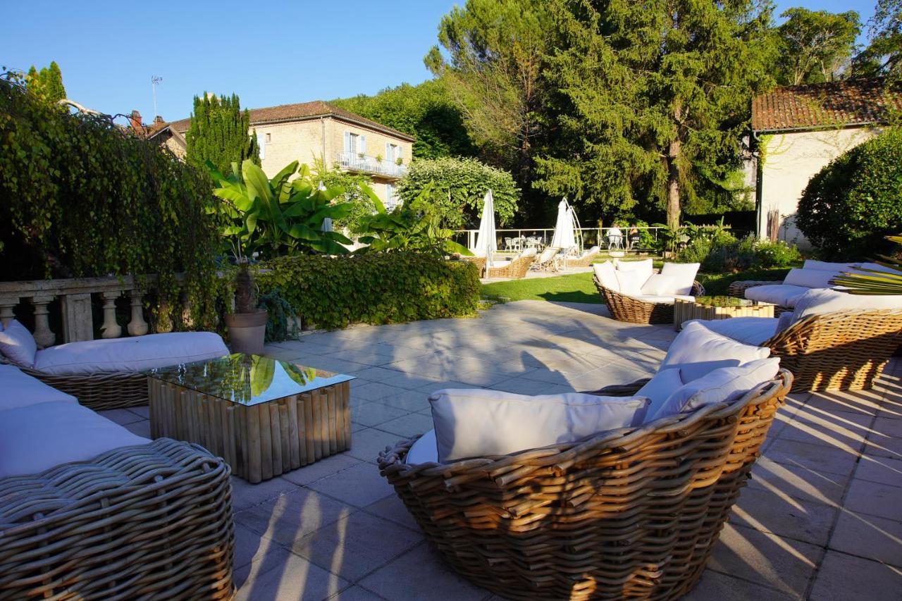 Hotel Restaurant Le Centenaire Les Eyzies Bagian luar foto