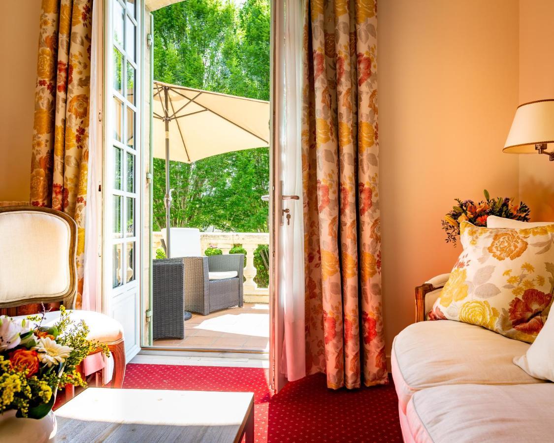 Hotel Restaurant Le Centenaire Les Eyzies Bagian luar foto