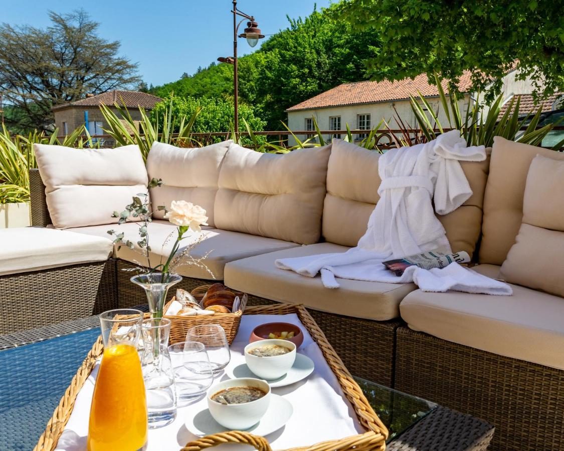 Hotel Restaurant Le Centenaire Les Eyzies Bagian luar foto