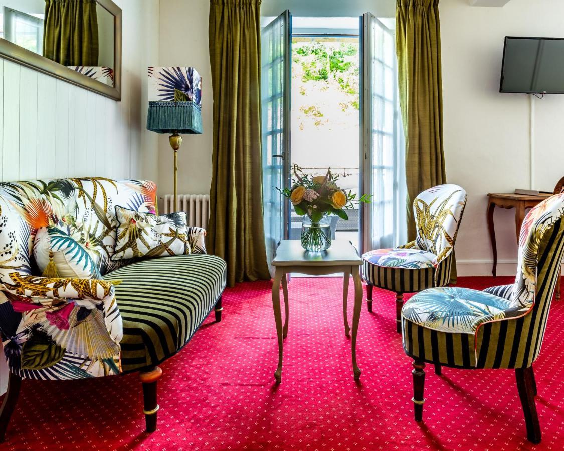 Hotel Restaurant Le Centenaire Les Eyzies Bagian luar foto