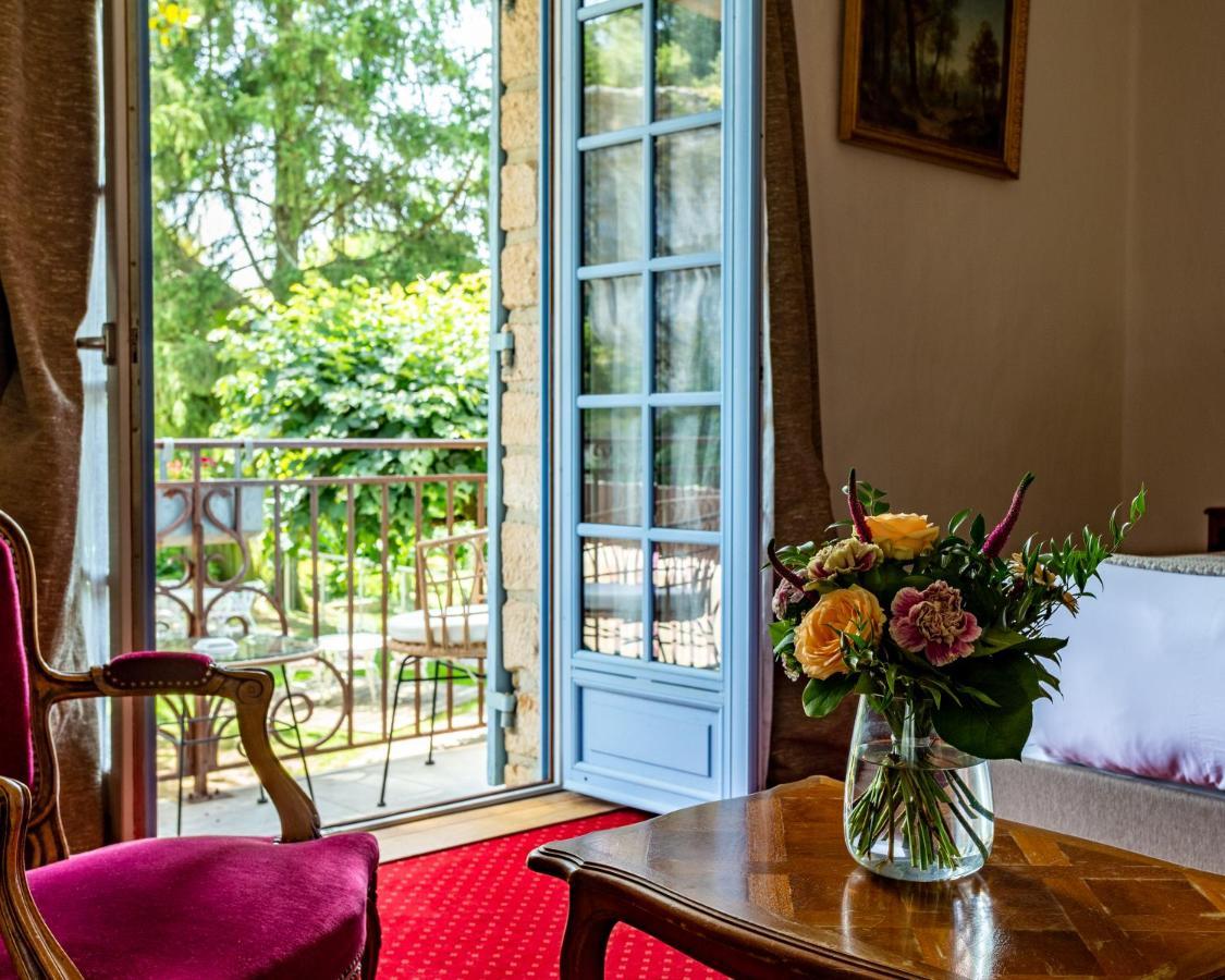 Hotel Restaurant Le Centenaire Les Eyzies Bagian luar foto
