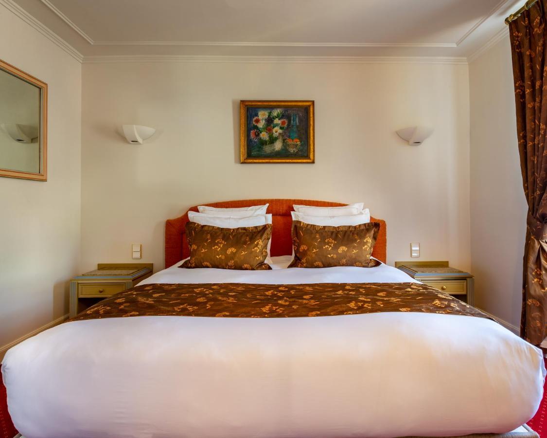 Hotel Restaurant Le Centenaire Les Eyzies Bagian luar foto