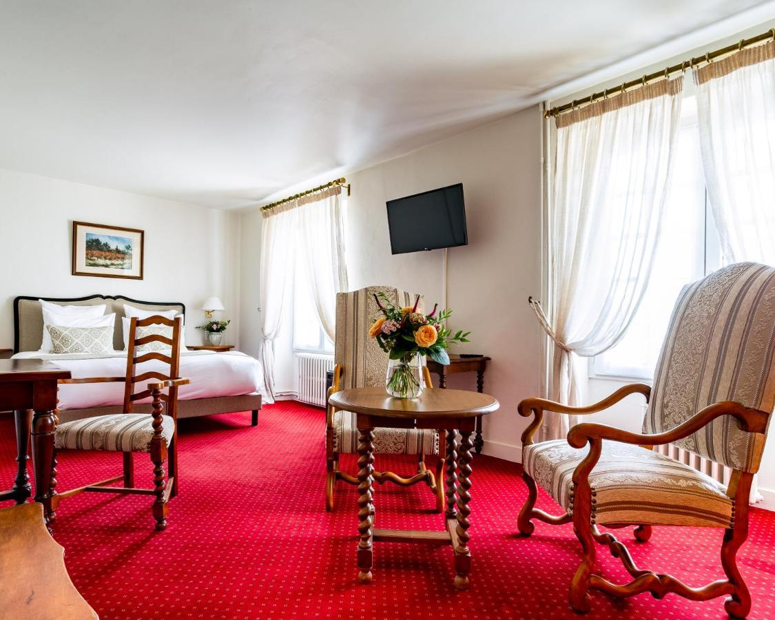 Hotel Restaurant Le Centenaire Les Eyzies Bagian luar foto