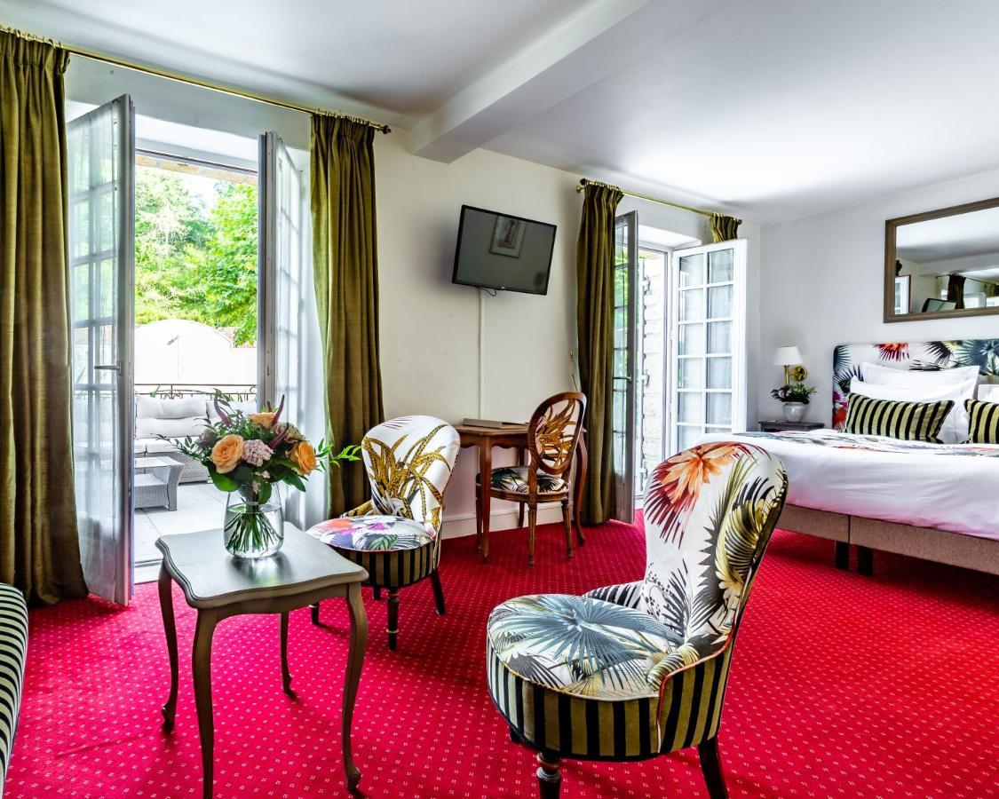 Hotel Restaurant Le Centenaire Les Eyzies Bagian luar foto