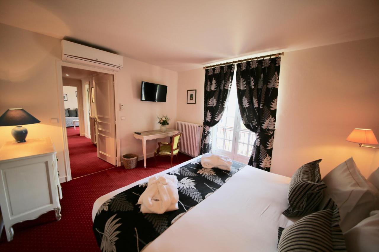 Hotel Restaurant Le Centenaire Les Eyzies Bagian luar foto