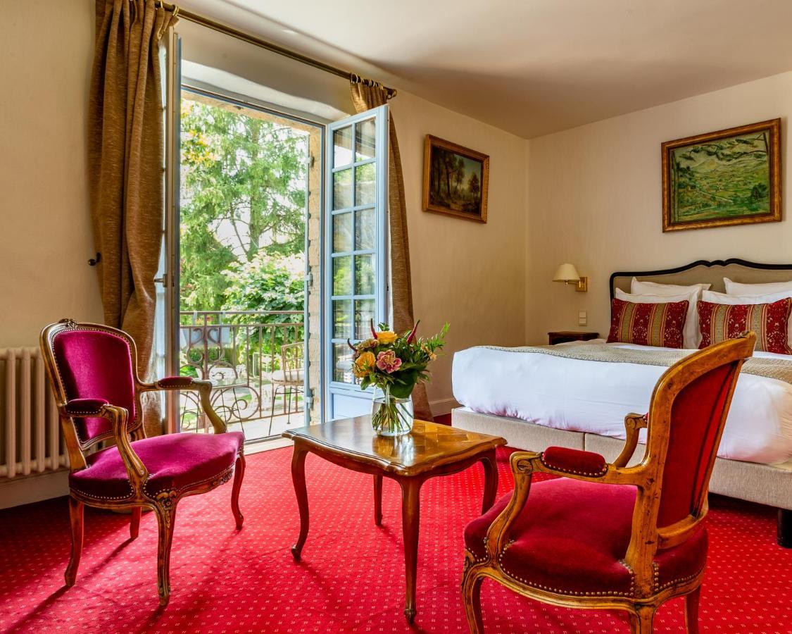 Hotel Restaurant Le Centenaire Les Eyzies Bagian luar foto