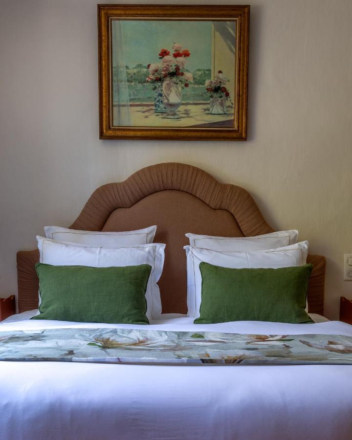 Hotel Restaurant Le Centenaire Les Eyzies Bagian luar foto