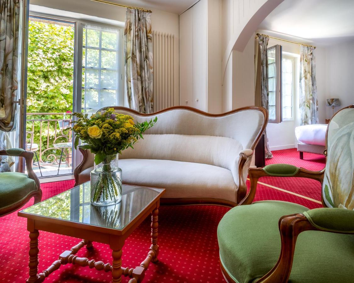Hotel Restaurant Le Centenaire Les Eyzies Bagian luar foto